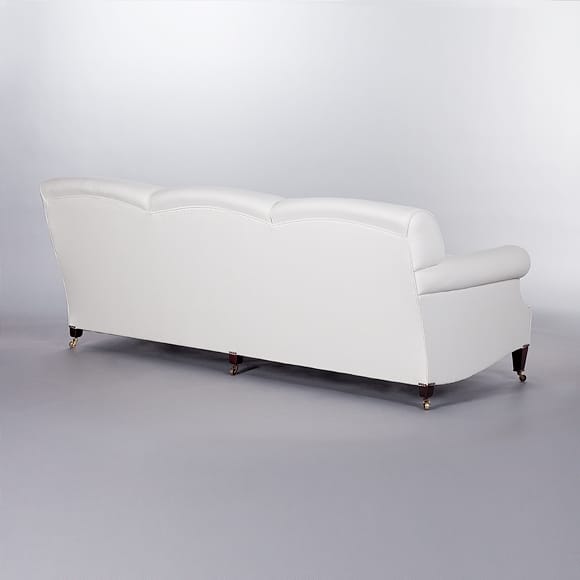 Laid Back Scroll Arm Signature Sofa. Monica James & Co. Miami Design District, South Florida. Local nation wide delivery.